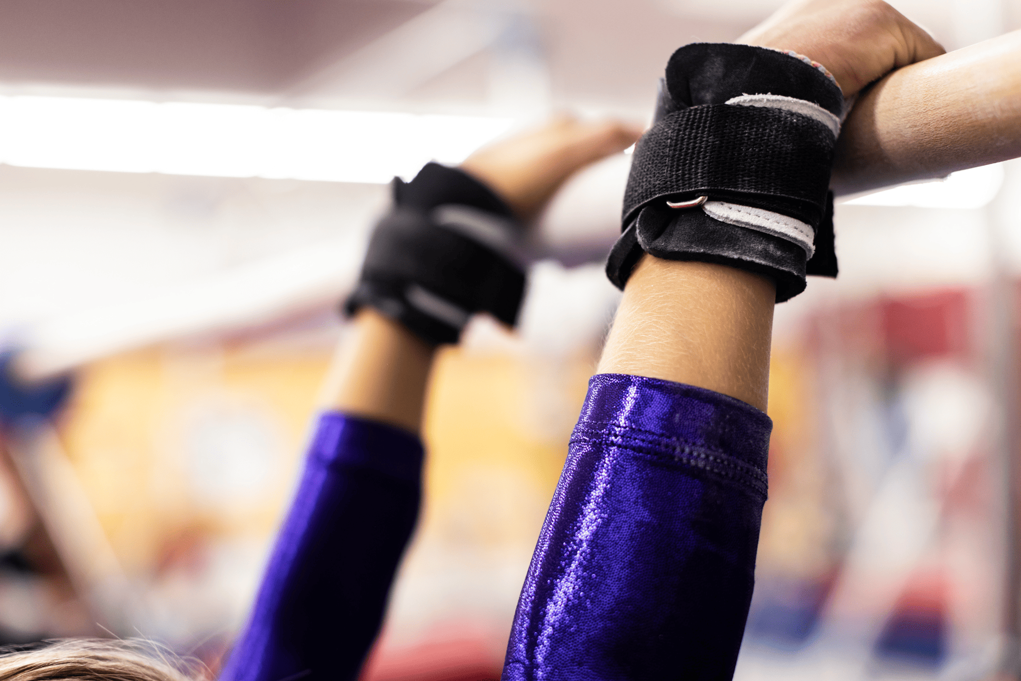 Gibson Just Right Uneven Bar Neo Grips on hands gripping bar