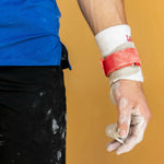 Reisport® Men's Elite Protec Ring Grips on hand