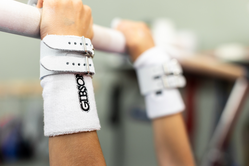 Gibson Just Right Uneven Bar double buckle grips on hands holding bar